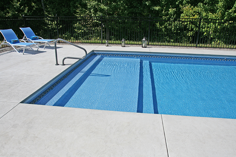 Swimming pool and hand finished concrete project example 89
